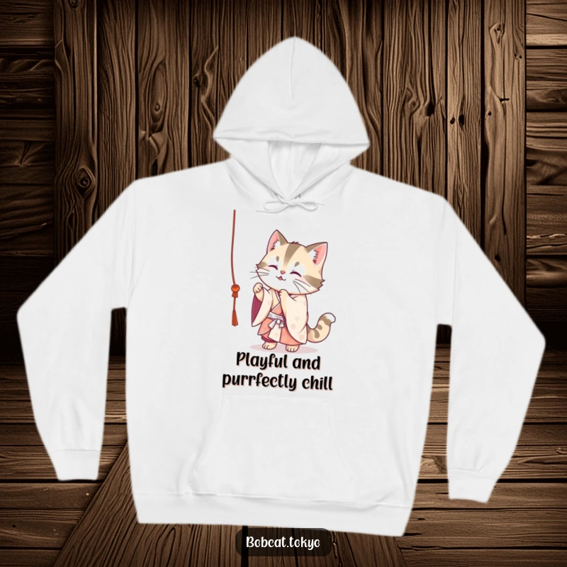 Funny Bobcat Hoodie: A cute bobcat in a flowing kimono playfully batting at a dangling string, embodying pure feline energy and fun.