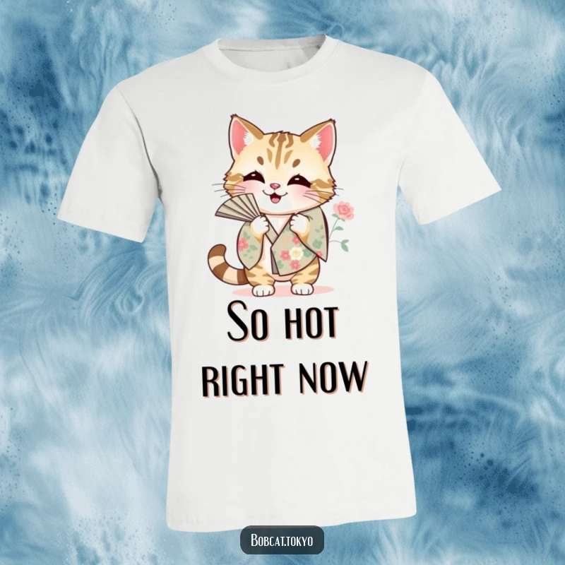 Funny T-Shirt with a bobcat fanning itself vigorously with a floral kimono sleeve, conveying heat and humorous exasperation.