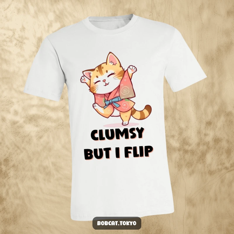 Funny Bobcat T-Shirt: A bobcat in a colorful kimono attempting a clumsy somersault, a humorous and eye-catching design.