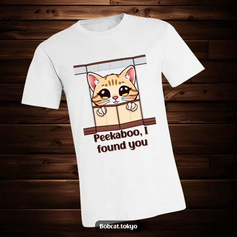 Funny T-Shirt with a bobcat sporting wide, excited eyes, peeking playfully from behind a decorative folding screen.